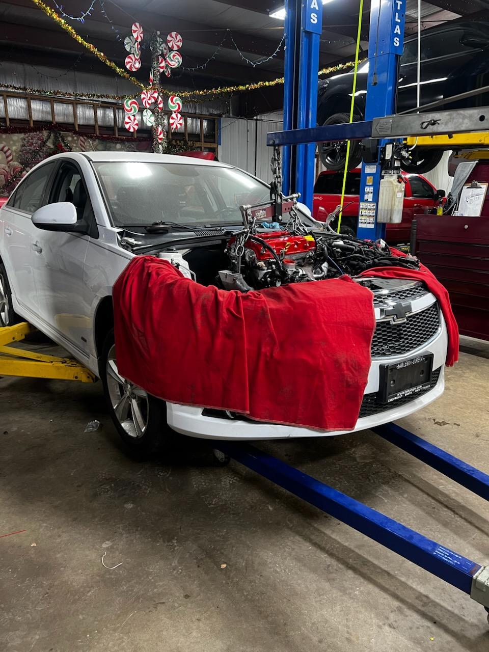 Engine work in the bay at Sahuayo Auto Repair Mendota