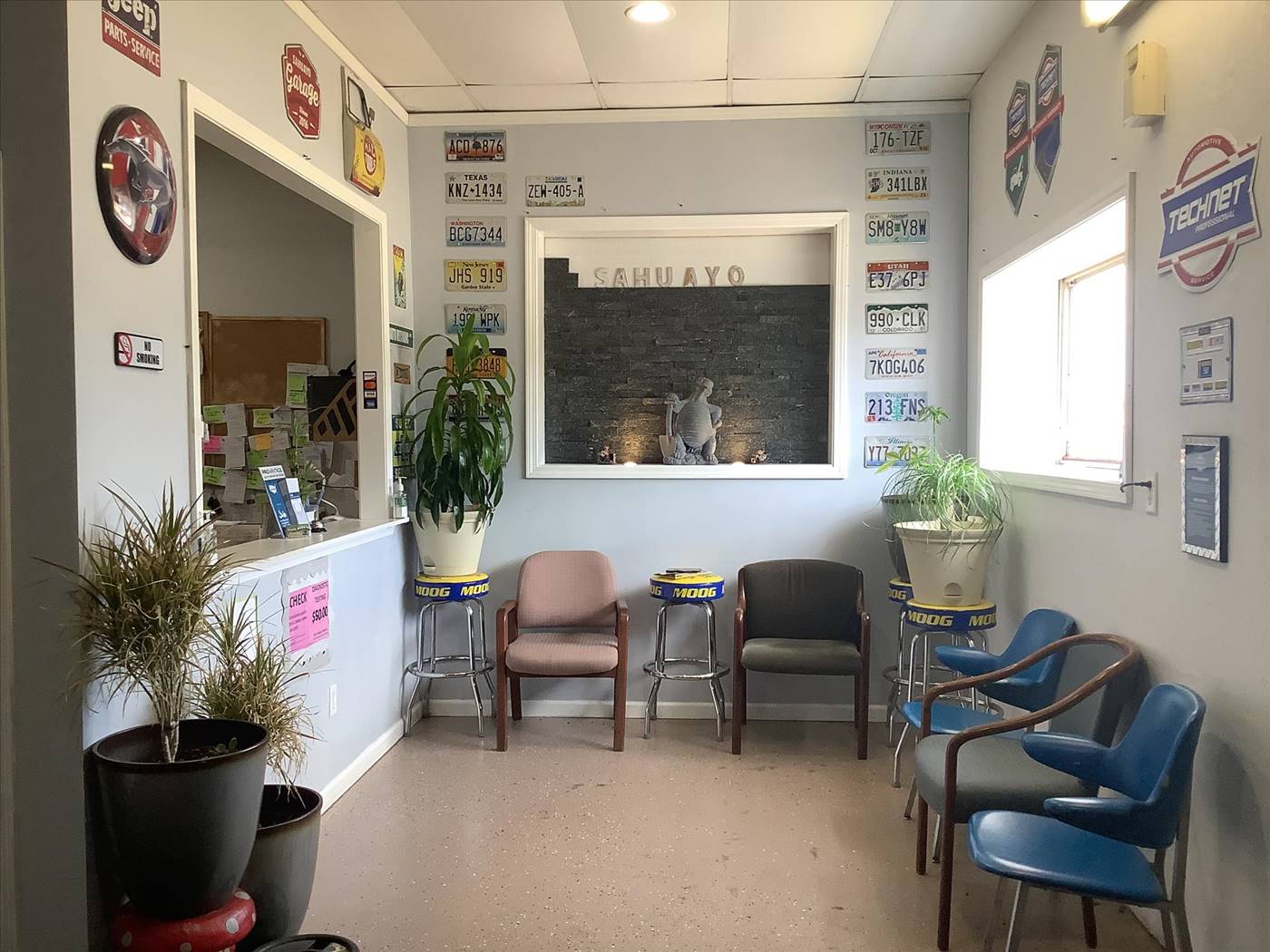 Waiting room with SAHUAYO letter wall and turtle statue
